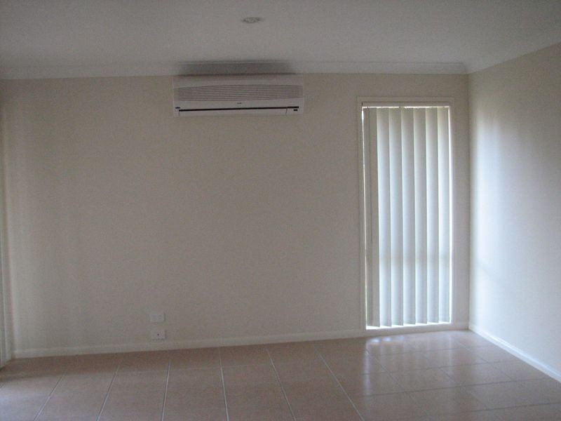 3 Starkey Street, Pacific Pines QLD 4211