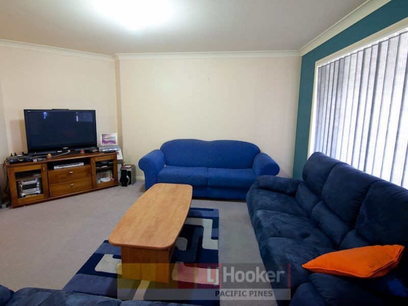 7 Palm Street, Pacific Pines QLD 4211