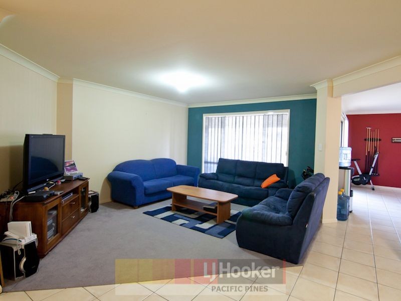 7 Palm Street, Pacific Pines QLD 4211