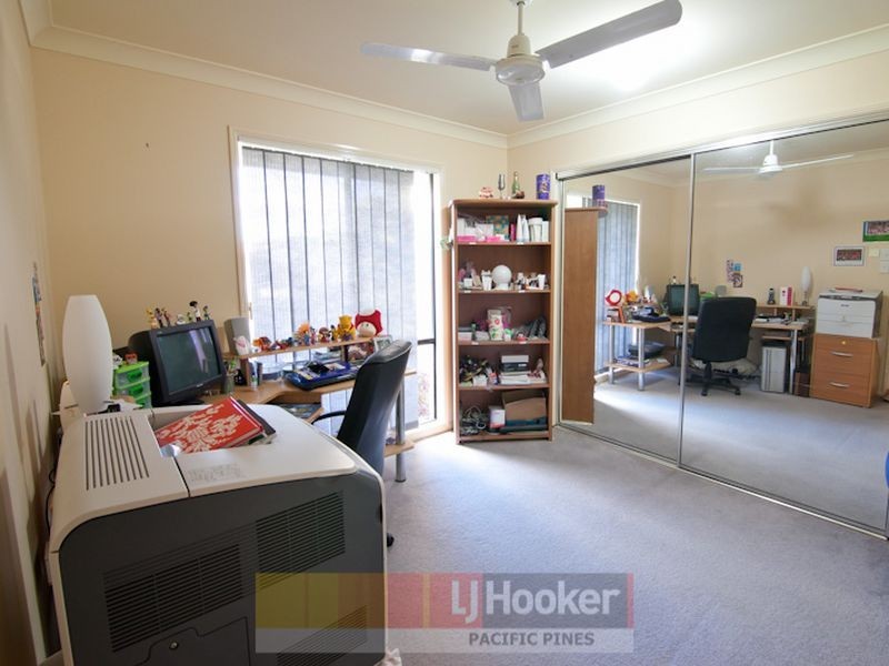 7 Palm Street, Pacific Pines QLD 4211