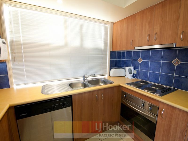 7 Palm Street, Pacific Pines QLD 4211