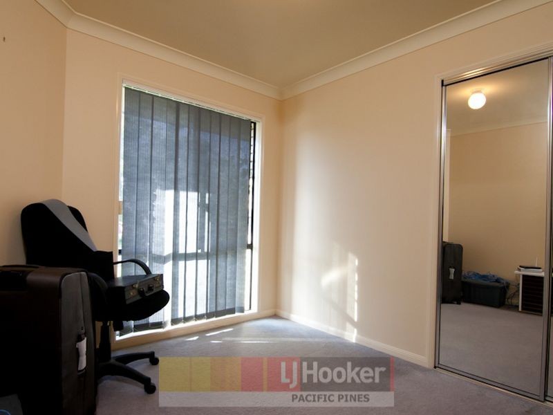 7 Palm Street, Pacific Pines QLD 4211