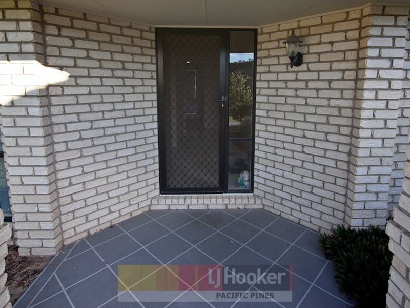 7 Palm Street, Pacific Pines QLD 4211