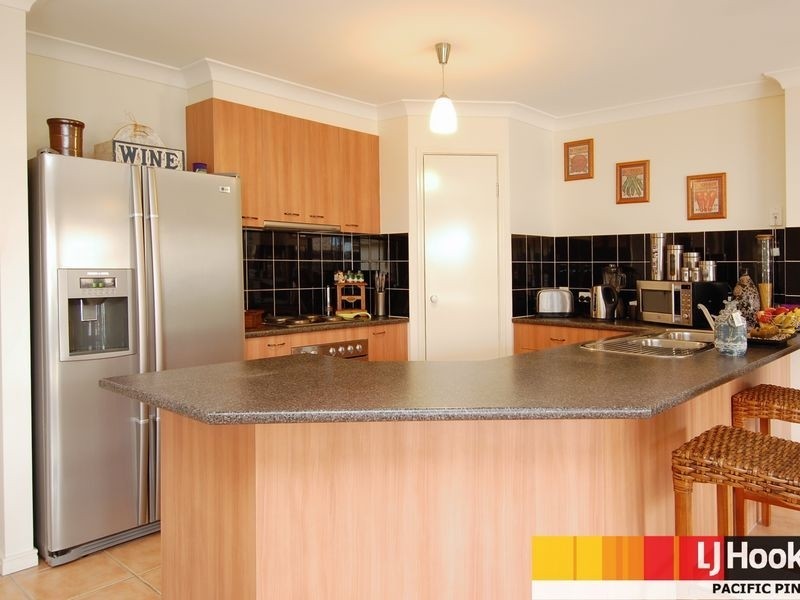 12 Irvine Street, Pacific Pines QLD 4211