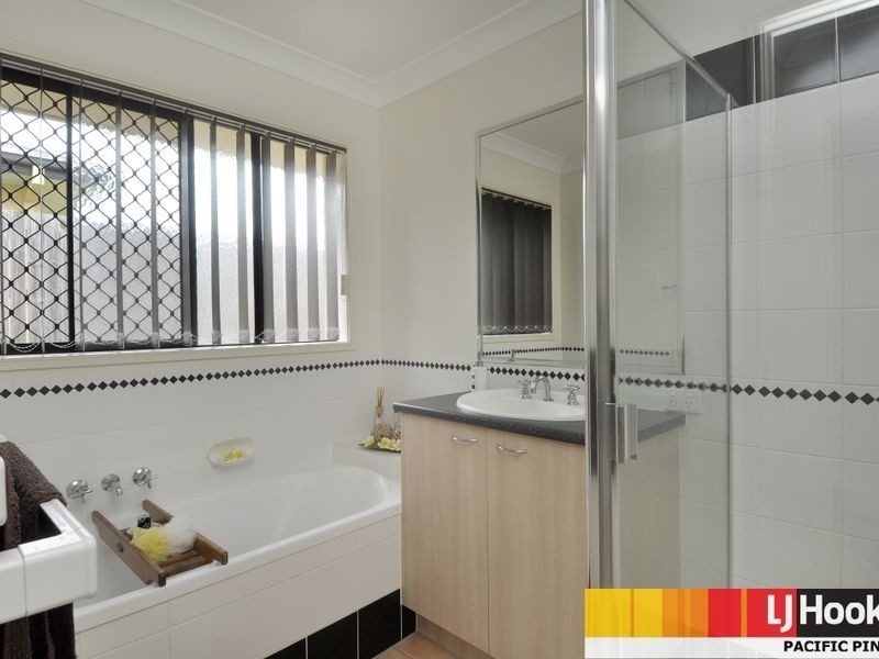 12 Irvine Street, Pacific Pines QLD 4211