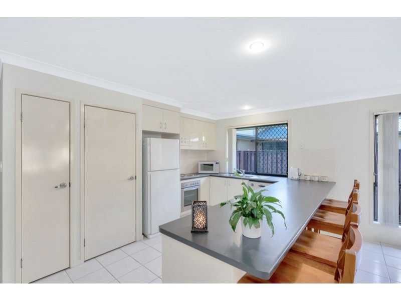 21 Carmarthen Circuit, Pacific Pines QLD 4211
