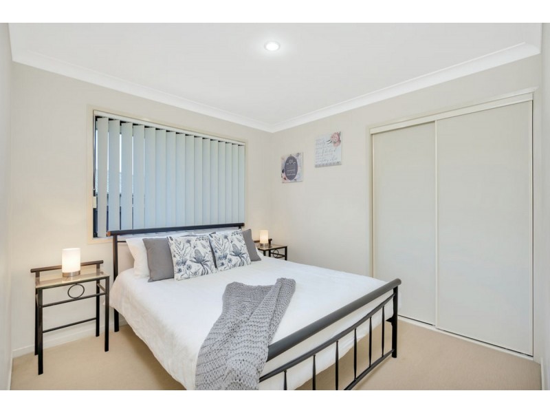 21 Carmarthen Circuit, Pacific Pines QLD 4211