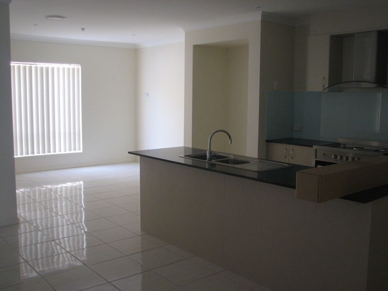 49 Barradeen Cct, Pacific Pines QLD 4211