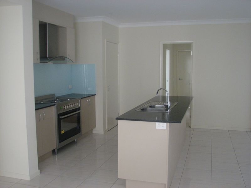 49 Barradeen Cct, Pacific Pines QLD 4211