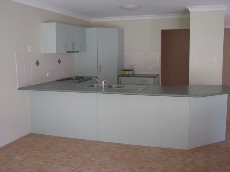 1/4 Stromlo Court, Pacific Pines QLD 4211