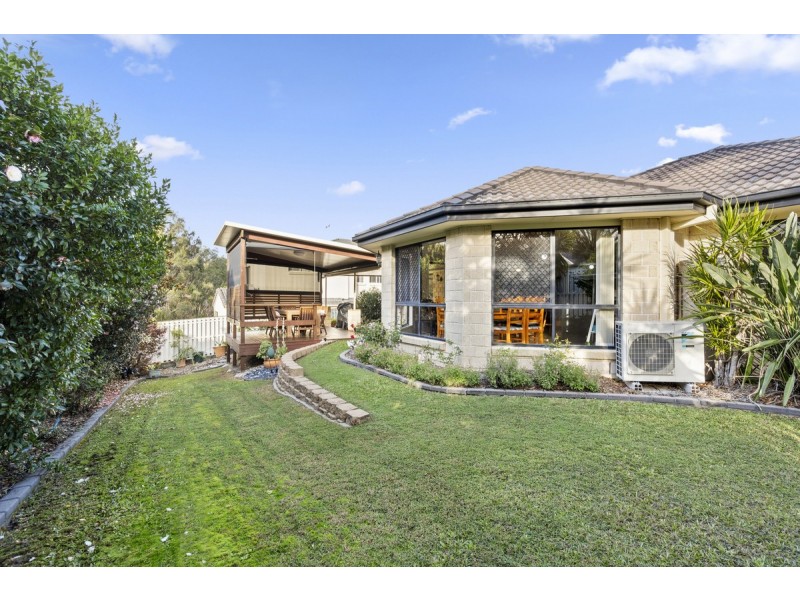 14 Palm Street, Pacific Pines QLD 4211