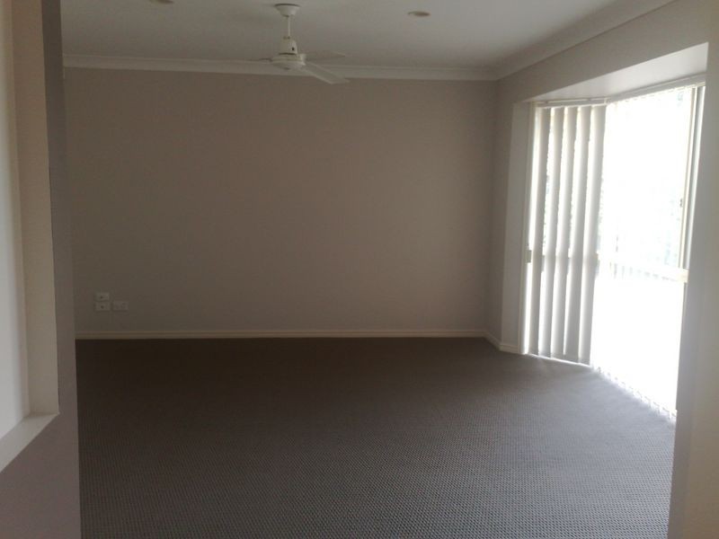 30 Manra Way, Pacific Pines QLD 4211