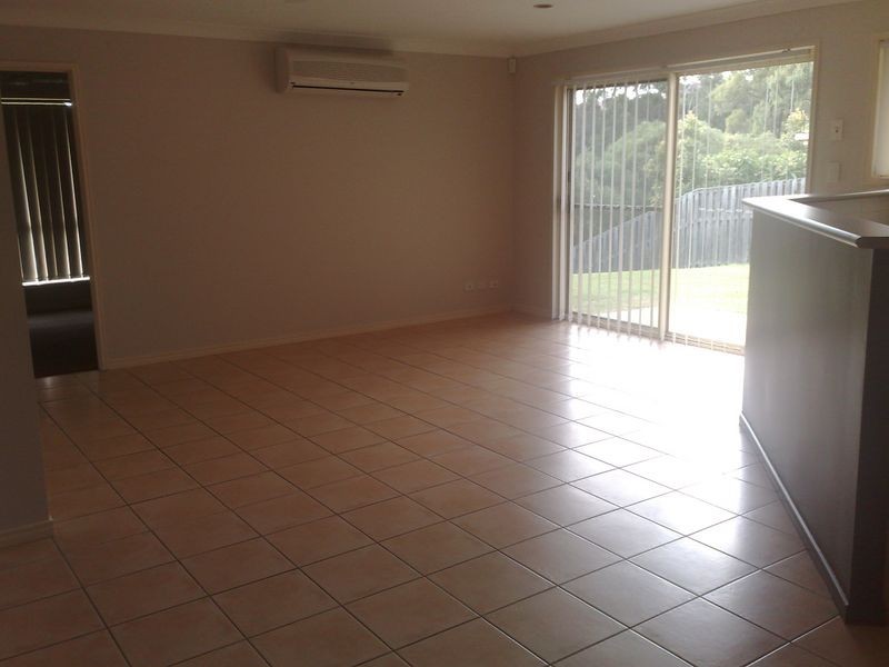 30 Manra Way, Pacific Pines QLD 4211