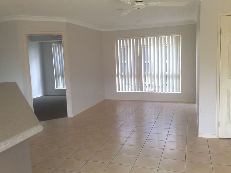 30 Manra Way, Pacific Pines QLD 4211