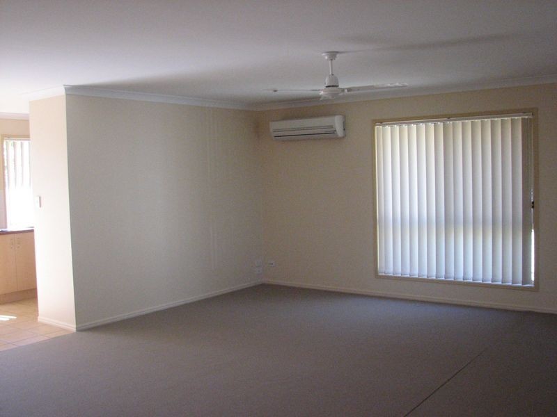 54 Manra Way, Pacific Pines QLD 4211