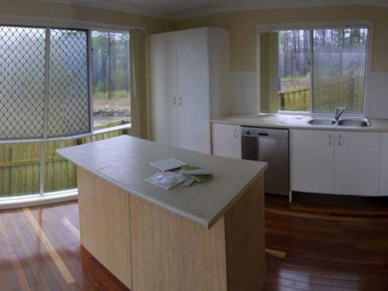 1 Norfolk Drive, Pacific Pines QLD 4211