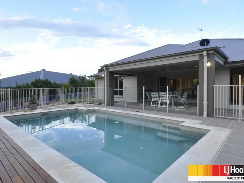 6 Huxley Court, Pacific Pines QLD 4211