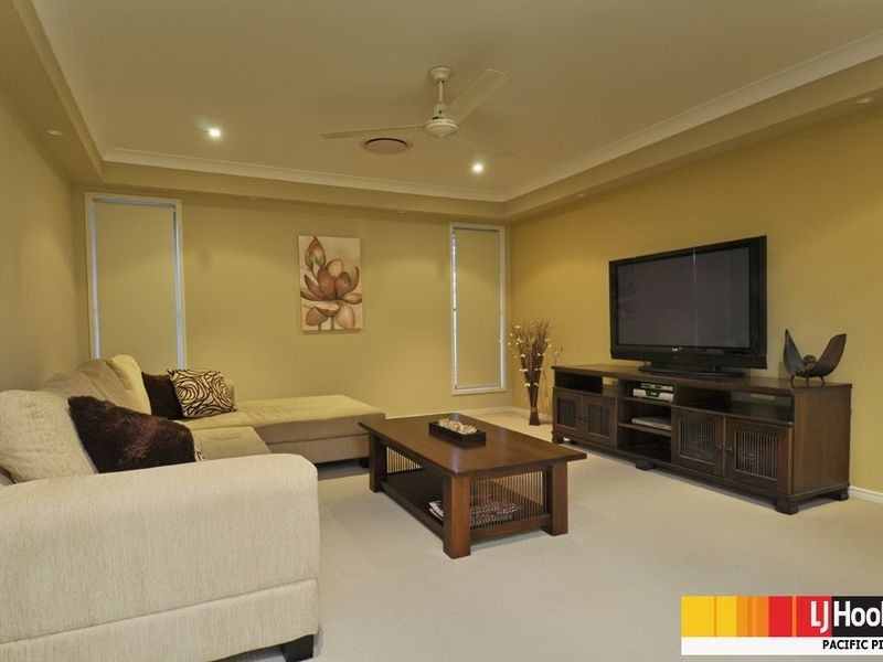 6 Huxley Court, Pacific Pines QLD 4211