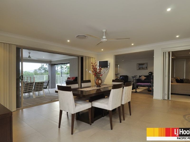 6 Huxley Court, Pacific Pines QLD 4211