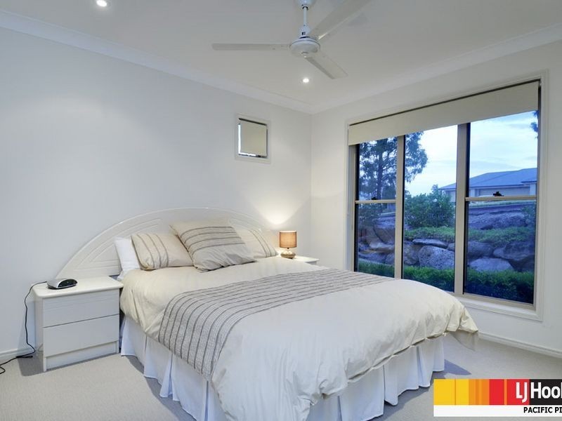 6 Huxley Court, Pacific Pines QLD 4211