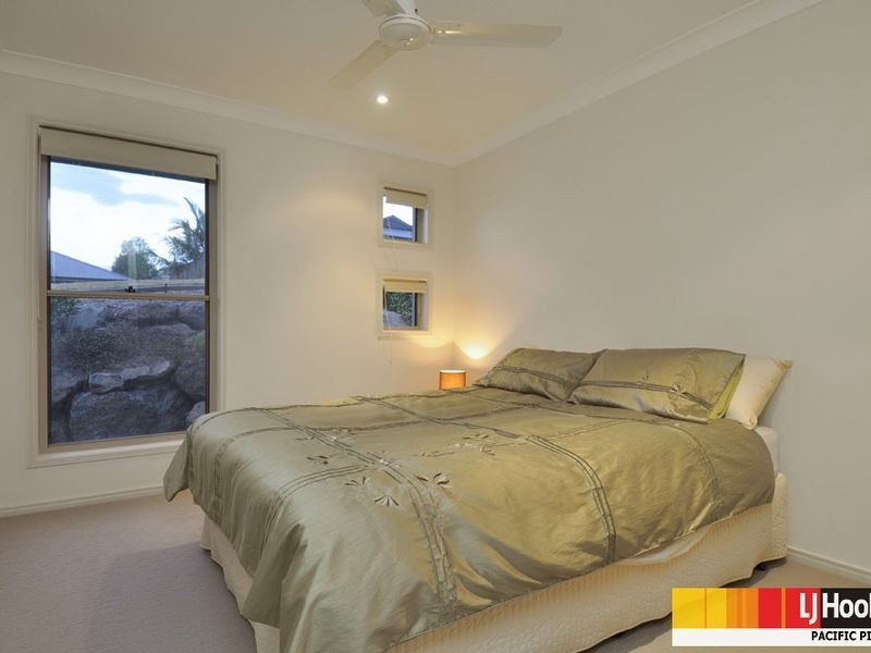 6 Huxley Court, Pacific Pines QLD 4211