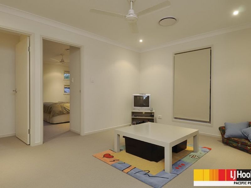 6 Huxley Court, Pacific Pines QLD 4211