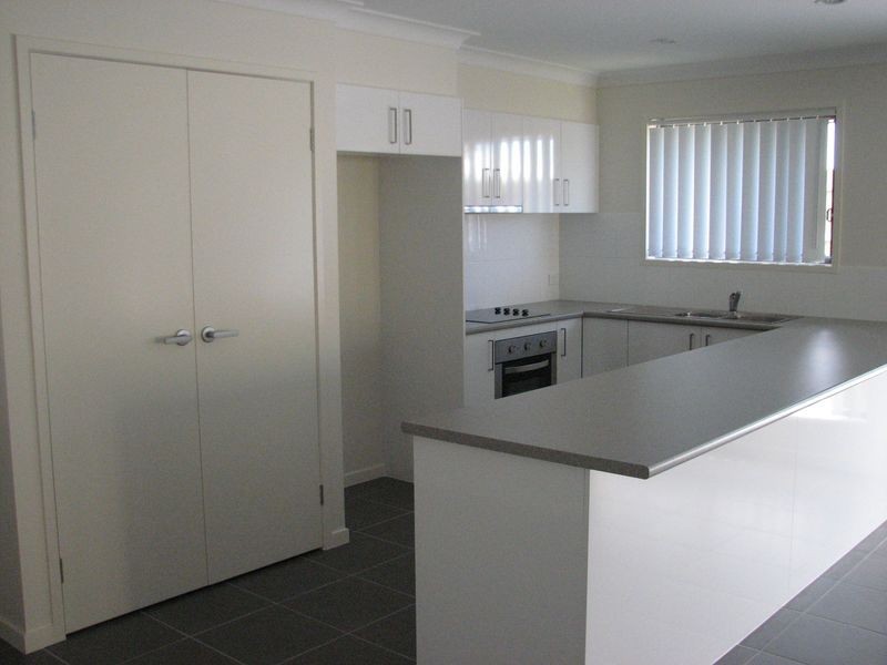 16 Fletcher Street, Pacific Pines QLD 4211