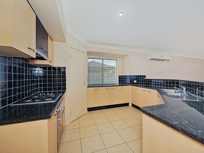 12 Wunburra Circle, Pacific Pines QLD 4211