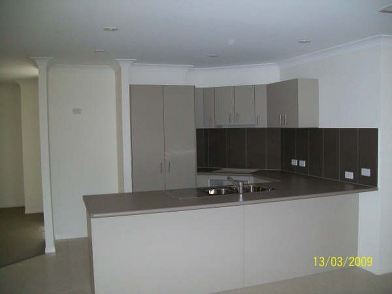 23 Barradeen Circuit, Pacific Pines QLD 4211