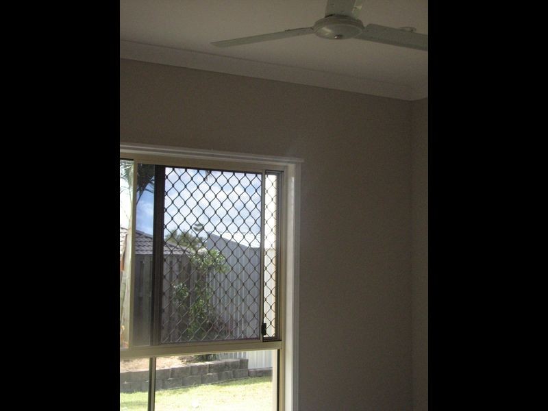 13 Irvine Street, Pacific Pines QLD 4211