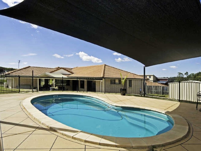 4 Chatham Avenue, Pacific Pines QLD 4211
