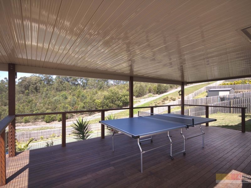 34 Wunburra Circle, Pacific Pines QLD 4211