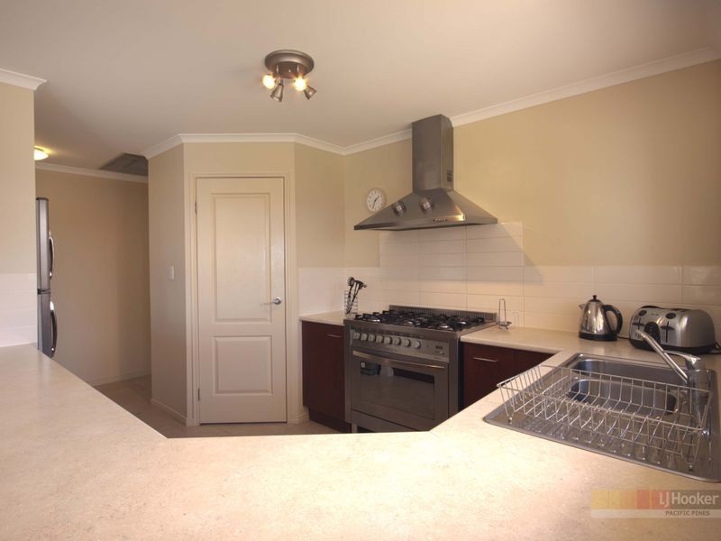 34 Wunburra Circle, Pacific Pines QLD 4211