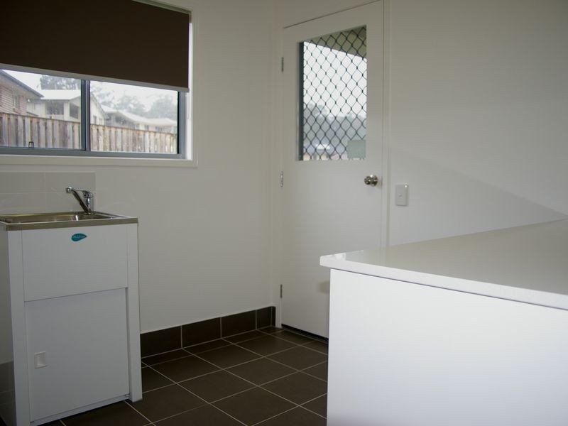 61 Laughlen Chase, Pacific Pines QLD 4211