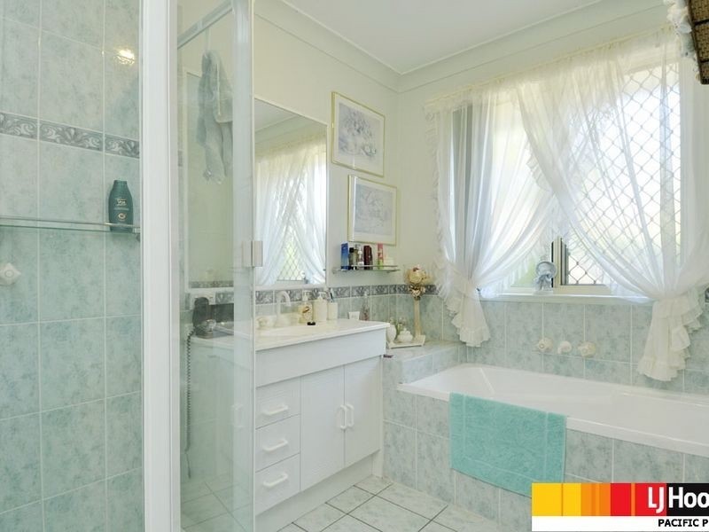 9 Kolonia Street, Pacific Pines QLD 4211