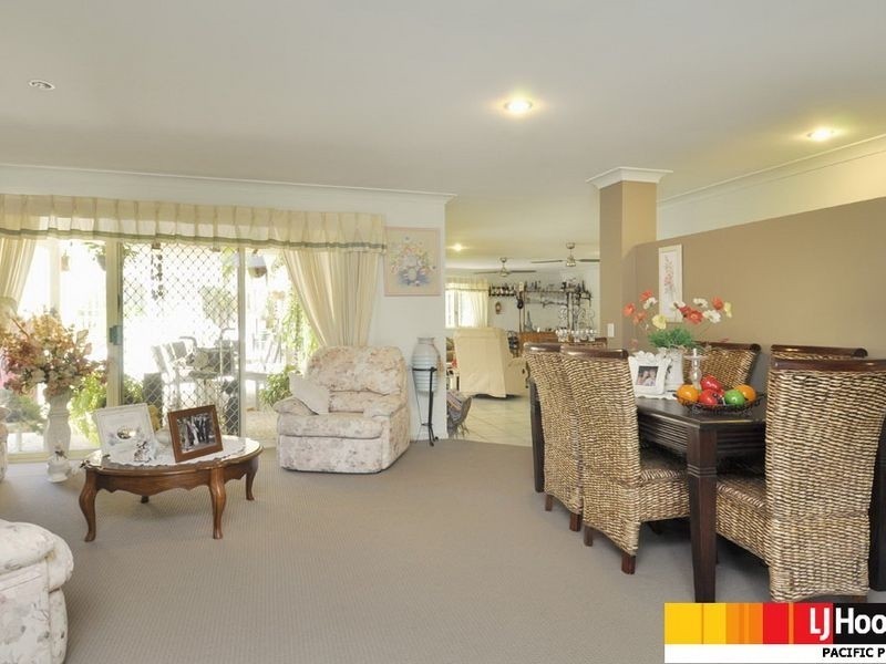 9 Kolonia Street, Pacific Pines QLD 4211