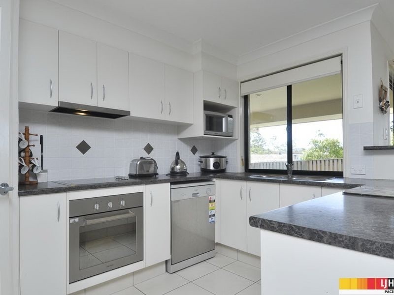 74 Harmsworth Road, Pacific Pines QLD 4211
