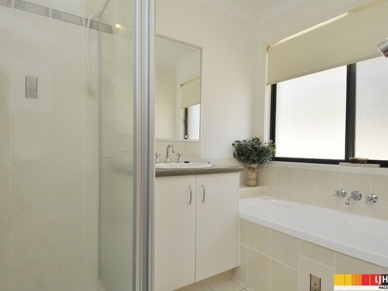 74 Harmsworth Road, Pacific Pines QLD 4211