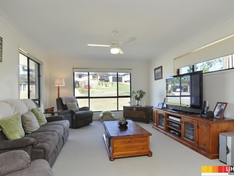 74 Harmsworth Road, Pacific Pines QLD 4211