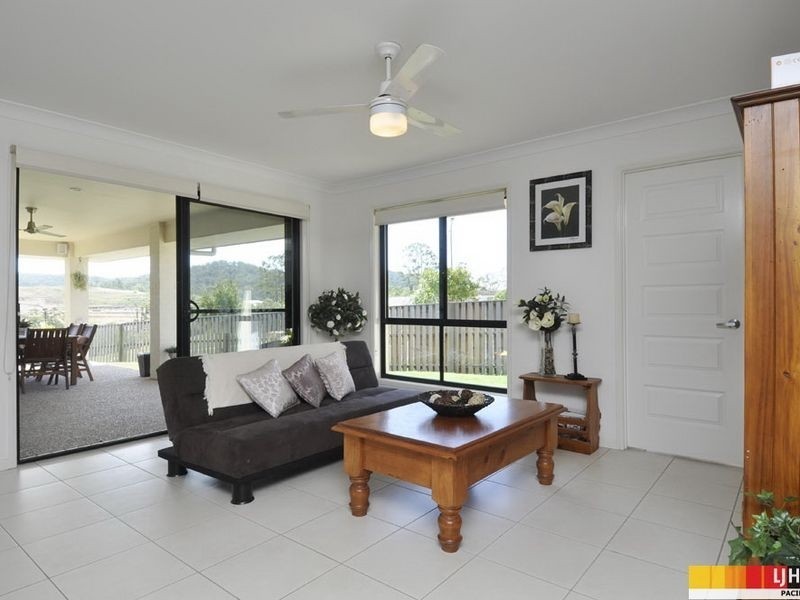 74 Harmsworth Road, Pacific Pines QLD 4211