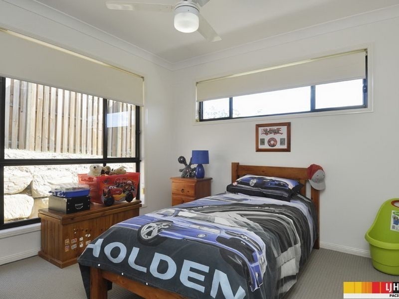 74 Harmsworth Road, Pacific Pines QLD 4211