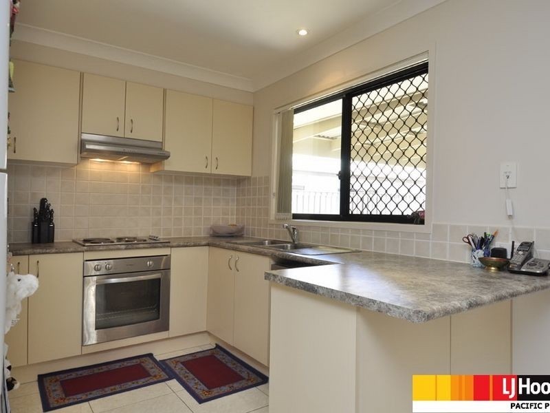 4 Gerard Street, Pacific Pines QLD 4211