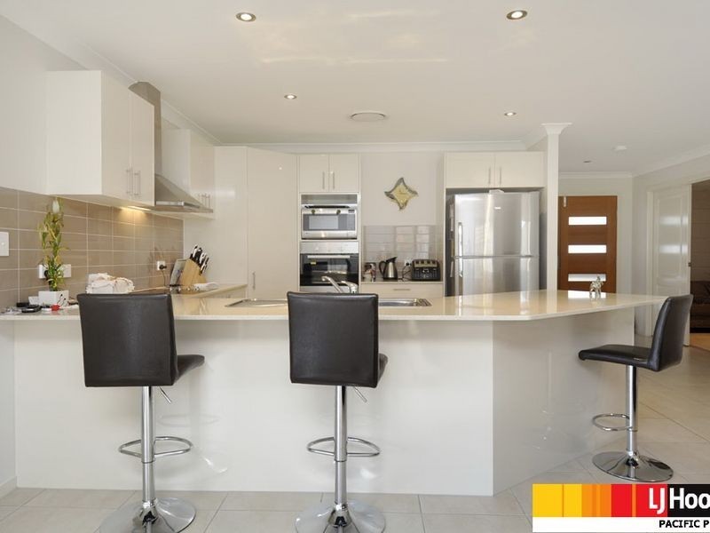 2 Kanangra Crescent, Pacific Pines QLD 4211