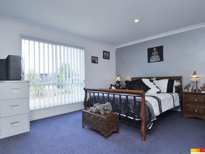 24 Manra Way, Pacific Pines QLD 4211