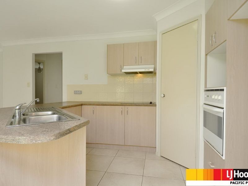 7 Malekula Rise, Pacific Pines QLD 4211
