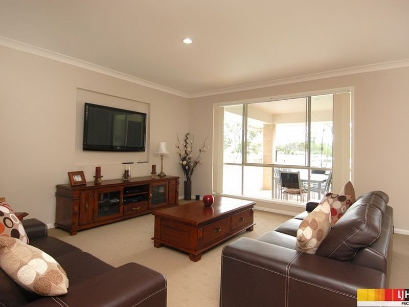 52 Harmsworth Road, Pacific Pines QLD 4211