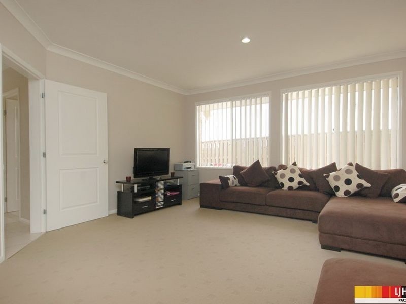 52 Harmsworth Road, Pacific Pines QLD 4211