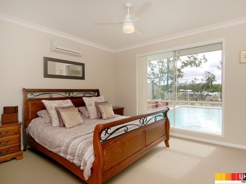 52 Harmsworth Road, Pacific Pines QLD 4211