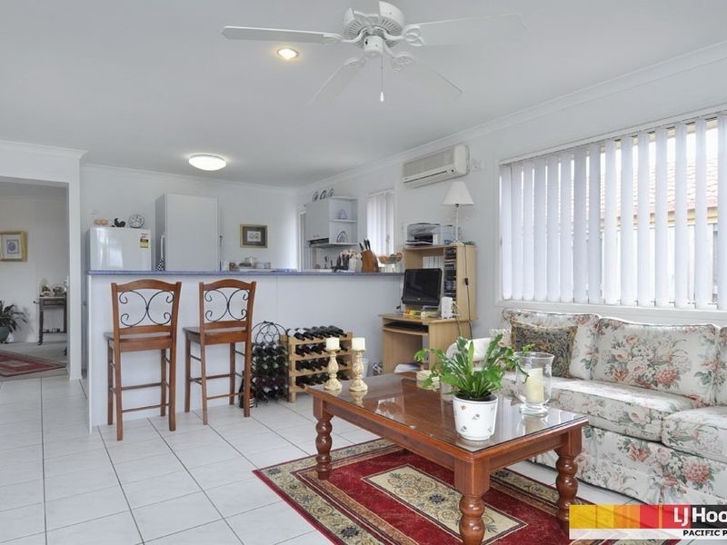 4 Mauke Place, Pacific Pines QLD 4211