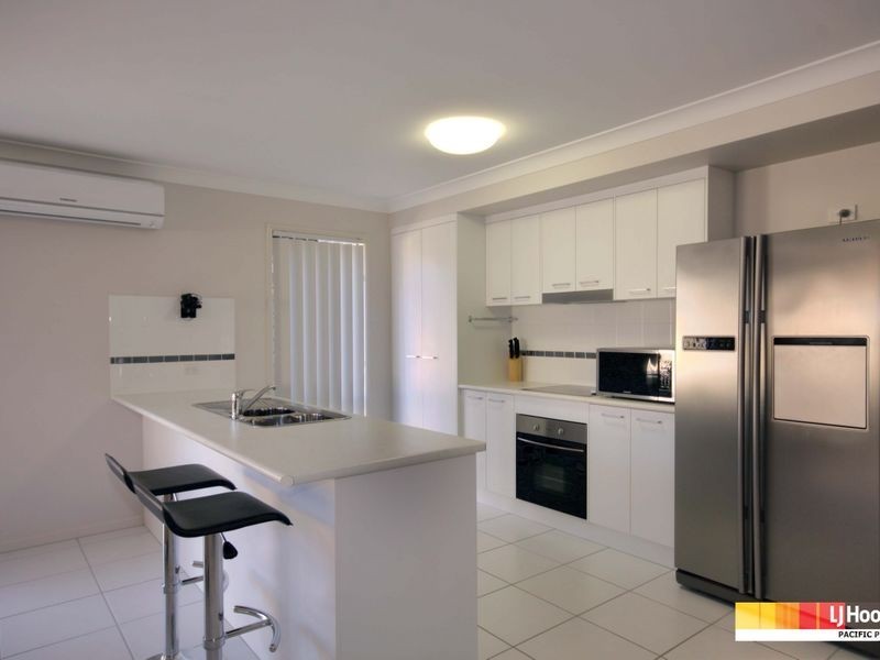 9 Hawkesbury Avenue, Pacific Pines QLD 4211